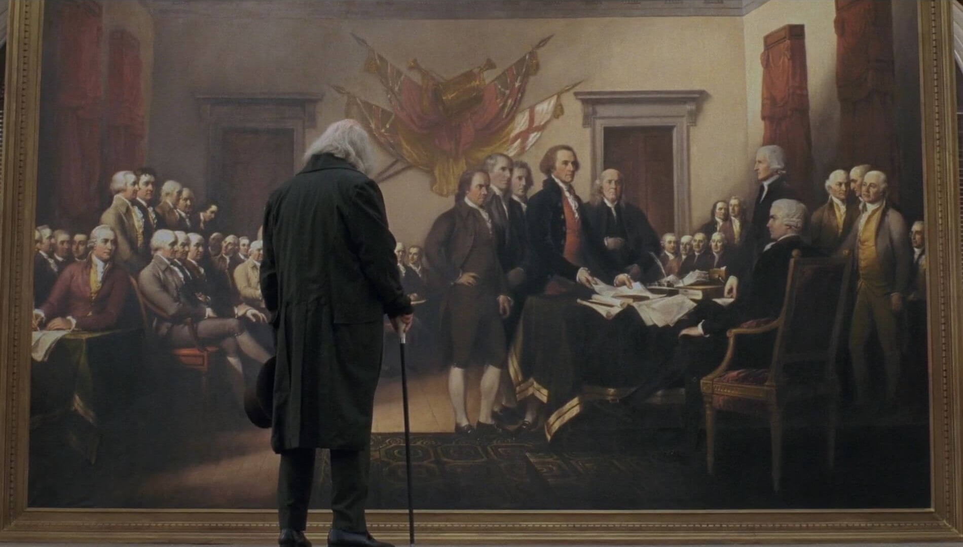 John Adams tarkastelee John Trumbullin Yhdysvaltain itsenäisyysjulistuksen allekirjoitus -maalausta.